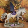 fée à cheval sur une licorne.