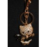 Porte clefs petit chat noir et doré fait de strass.